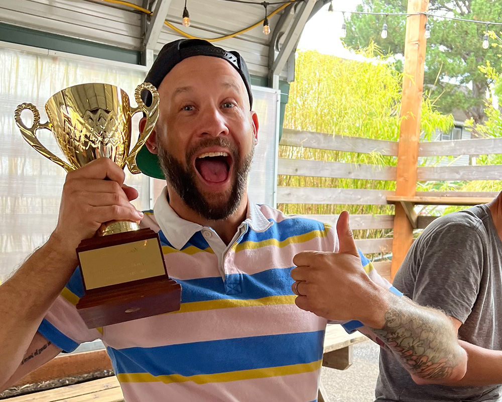 Ben holding the famous Planet Argon trophy cup