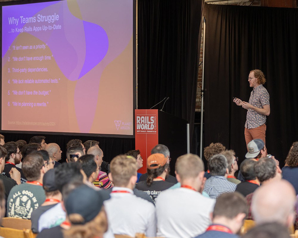 Robby Russell speaking about technical debt at Rails World 2024